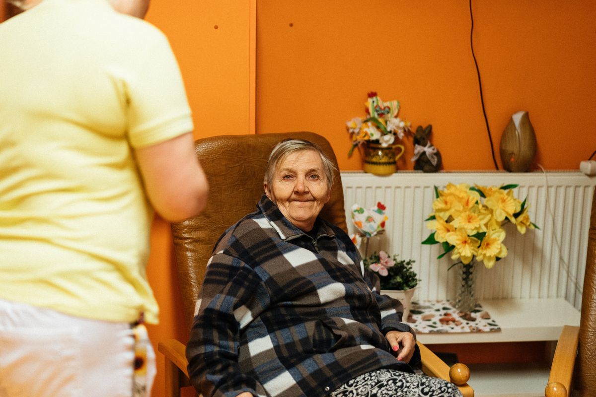 Caregiver offering reassurance so family caregivers can rest